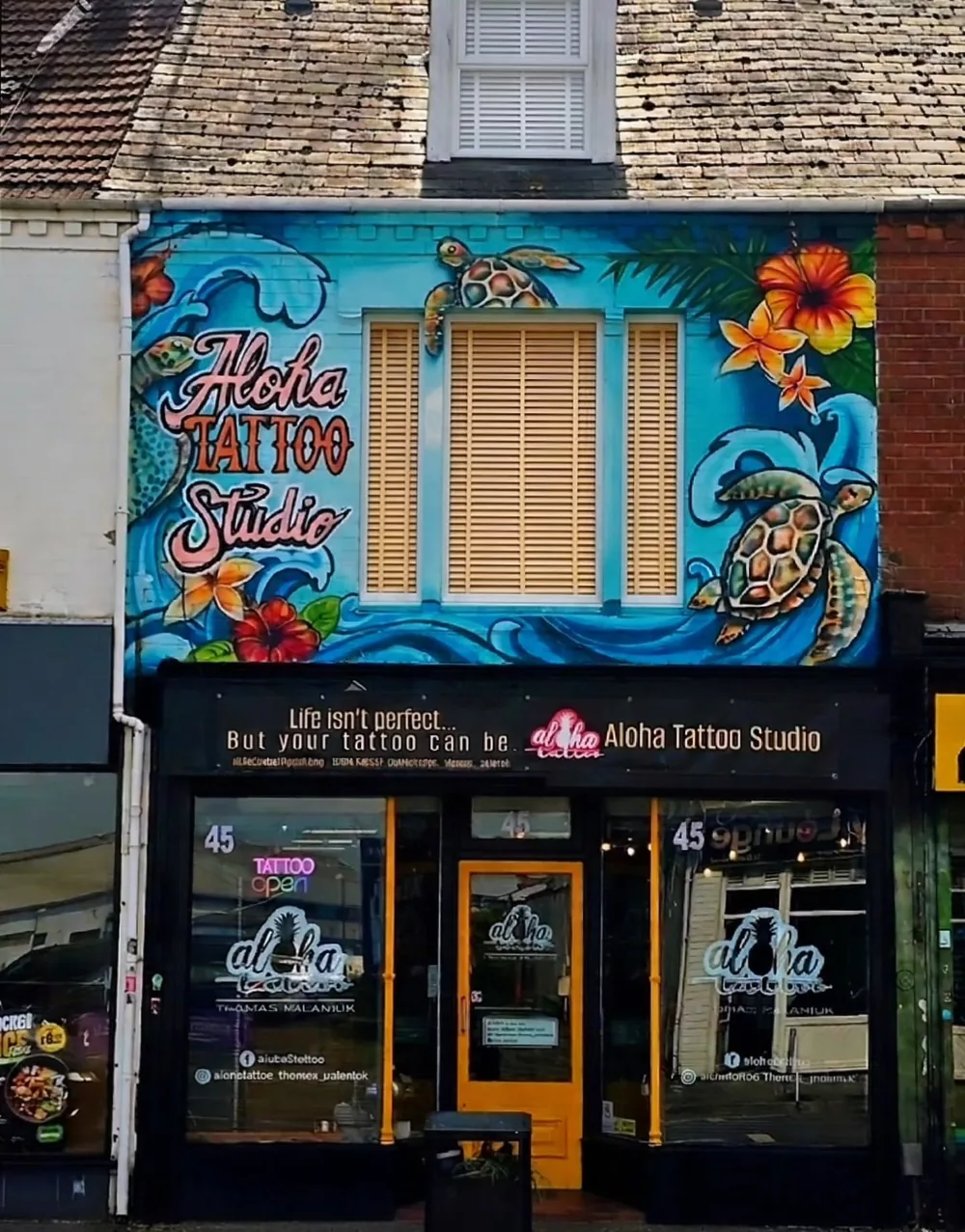 Aloha Tattoo Studio painted shopfront in Gloucester